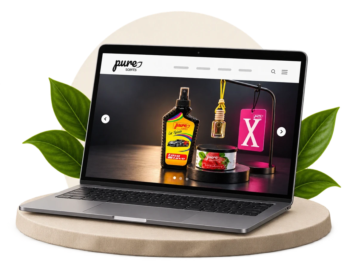 Pure Scents company website displayed on a laptop