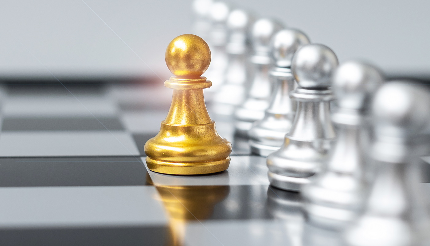 golden chess pawn pieces or leader businessman stand out of crow